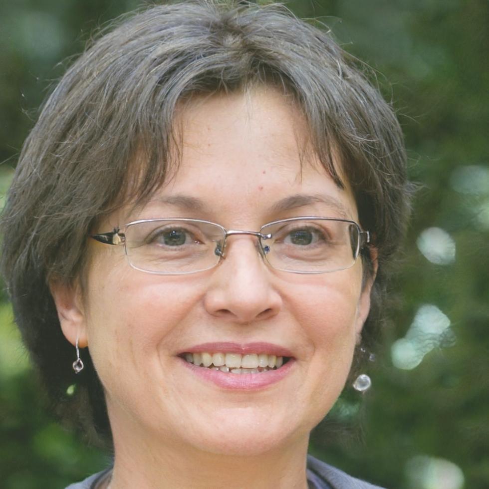 Financial analyst Helena Kaczmarek reviewing business data and market trends